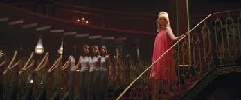 Main character of Last Night in Soho reflected in mirror as she explores the dream realm